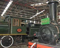 Two historic steam locomotives in the Outeniqua Transport Museum in George.