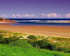 The mouth of the Bushmans River on South Africa's Sunshine Coast and the Indian Ocean beyond.