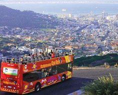 A Citysightseeing open-top bus above Cape Town