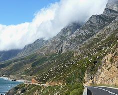 Clarence Drive navigates the spectacular coastline between Gordon's Bay and Rooiels on the eastern shores of False Bay near Cape Town.