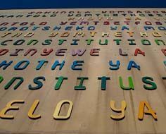The words 'Constitutional Court' written on the exterior of the court building in all eleven of South Africa's official languages.