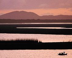 Sunset over St. Lucia Lake near Fani's Island in the iSimangaliso Wetland Park, a UNESCO World Heritage Site.