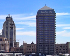 A section of the Sandton CBD with Sandton City Mall in the foreground and beyond it Nelson Mandela Square and Towers.