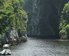 The Storms River Gorge, just above the river mouth, with the Parksboard inflatable moored to the left bank.