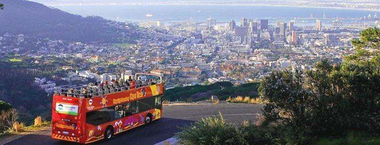 A Citysightseeing open-top bus above Cape Town