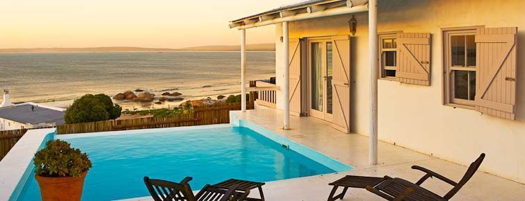 Paternoster Seaside cottages - pool and view